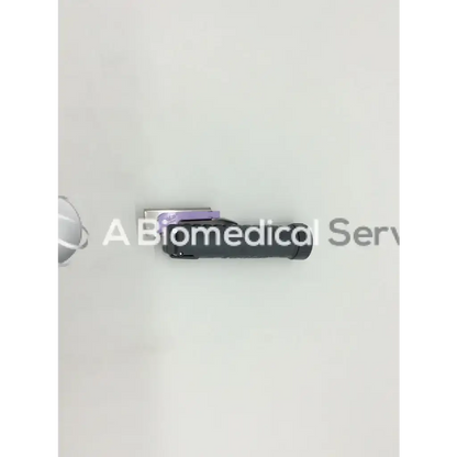 Black and purple medical device with metallic accents teleflex rusch trulite mill 0 for precise surgical use