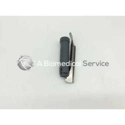 Black and silver surgical laryngoscope with textured grip handle teleflex rusch trulite secure model 004670001