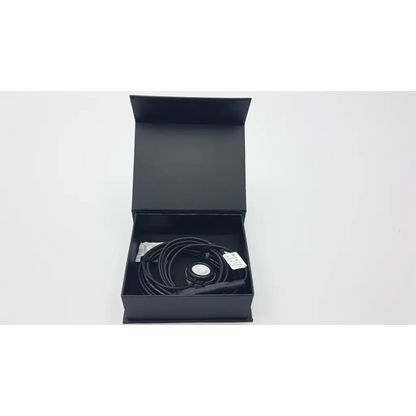 Black coiled cable with circular metallic connector in sleek box for telehealth technologies pcp-usb stethoscope use