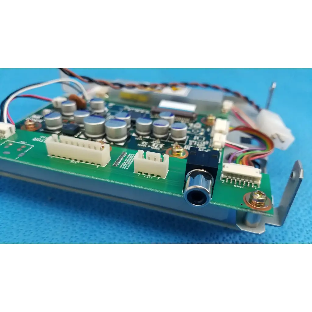 Green circuit board with silver capacitors white connectors and black audio jack for teli q3b15569fsa lcd monitor control panel