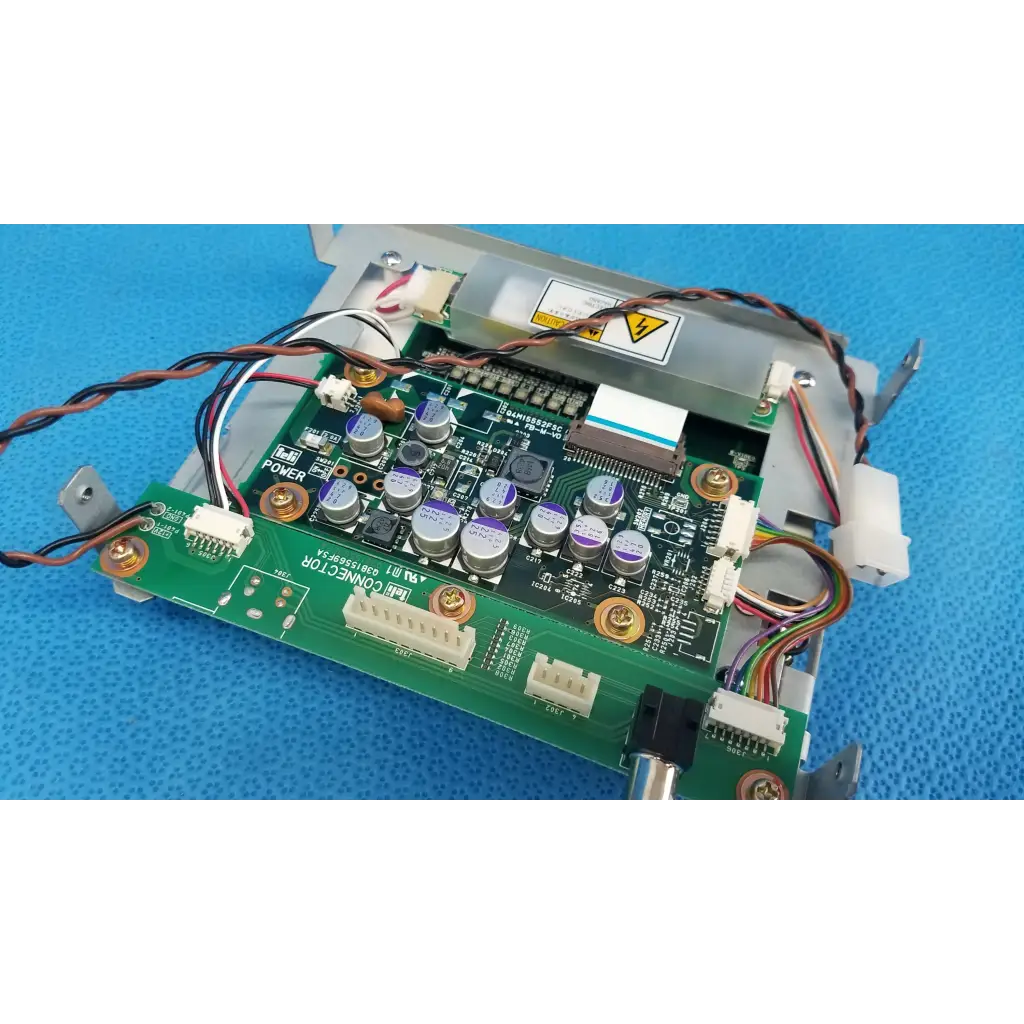 Green printed circuit board with silver capacitors and white connectors for teli lcd monitor control driver board panel