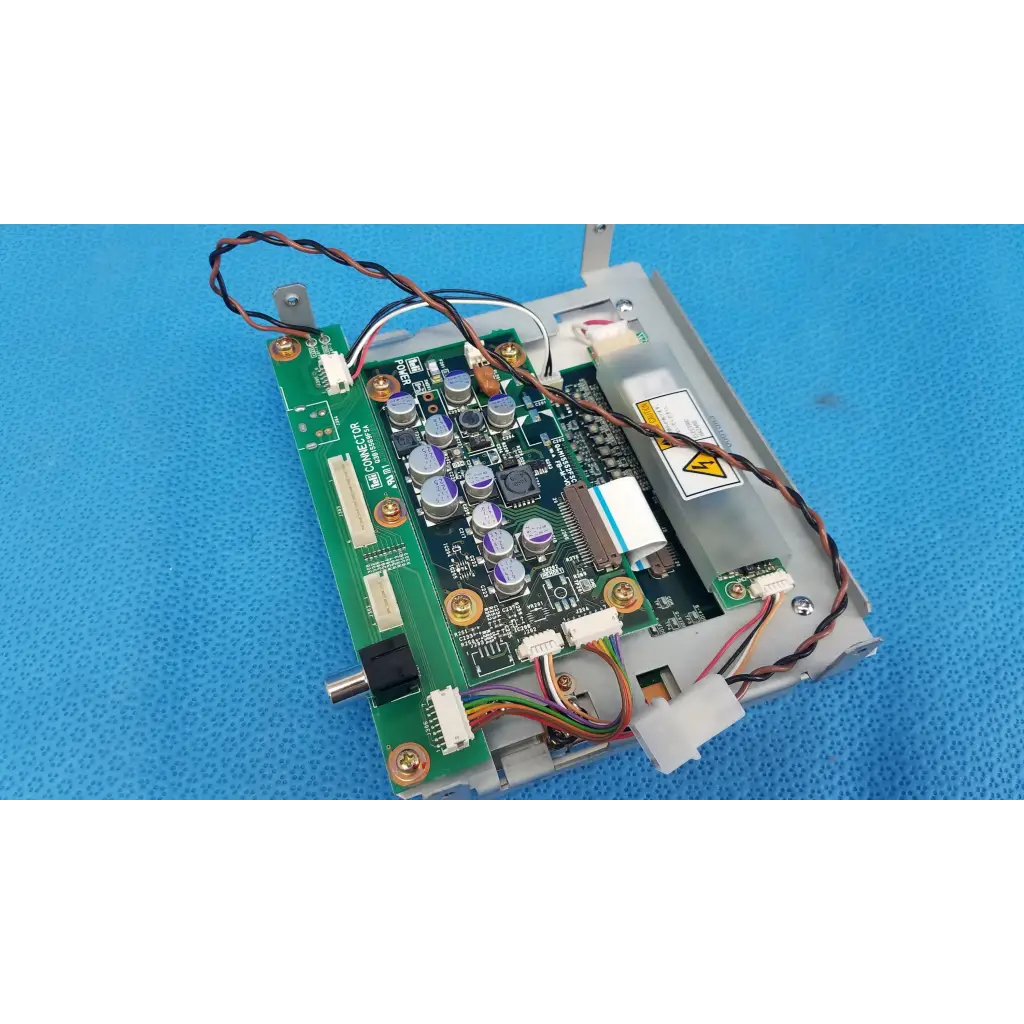Green circuit board with silver capacitors and black integrated circuits for teli lcd monitor control driver board panel