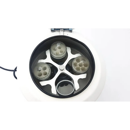 White thermo centra cl2 benchtop centrifuge with four transparent rotor cups and a central silver hub