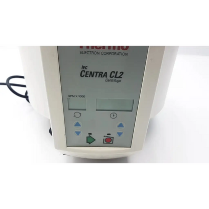 White plastic control panel of thermo centra cl2 benchtop centrifuge with digital display and button controls