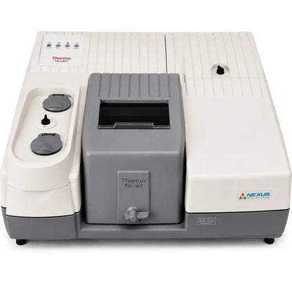 Gray and white thermo nicolet nexus 670 ft-ir spectrometer with ribbed housing and control panel on the left side