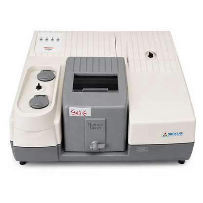 Gray and white thermo nicolet nexus 670 ft-ir spectrometer with ribbed housing and control knobs biomed certified