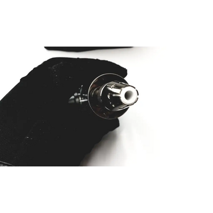 Thermo scientific apci probe featuring a shiny chrome-finished vape pen with a white ceramic mouthpiece
