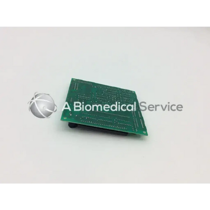 Green rectangular circuit board with silver traces and holes for thermo scientific genisys 2 control board ku-09194v-0