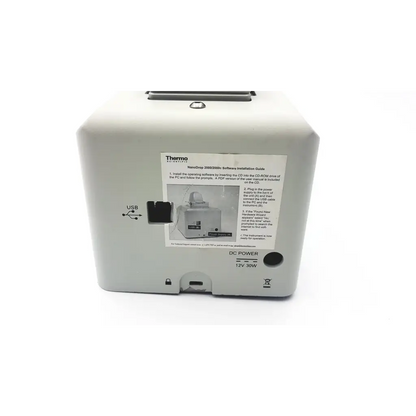 Back side of white thermo scientific nanodrop 2800 3500 spectrophotometer with usb port and 12v 30w dc power input