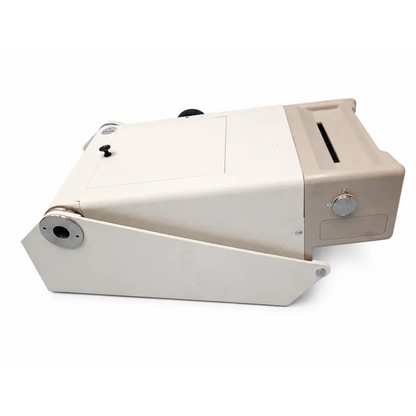Beige and white titmus 2s vision screener with metallic accents and carrying case biomed certified product