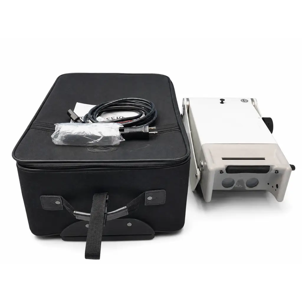 White and gray titmus 2s vision screener with black power cord and plastic-wrapped accessories in black carrying case biomed certified