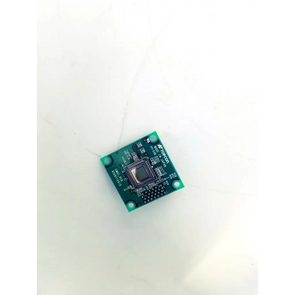 Green rectangular topcon cmos-pcb board bbcb3-10a 22523sm with central black integrated circuit and torcon branding