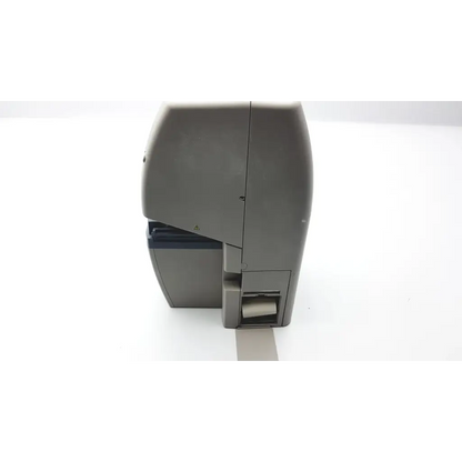 Gray zebra label printer with sleek compact design and paper roll output slot for advance automatic lensmeter use