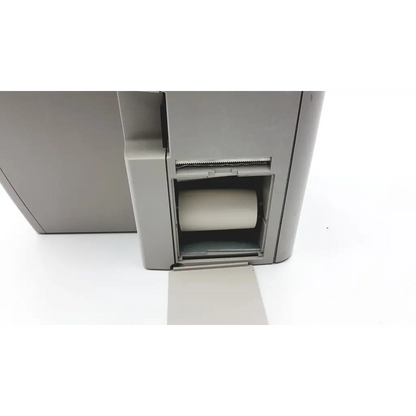 Gray plastic paper tray with beige thermal paper roll for Topcon EZ 200 advance automatic lensmeter model 416143
