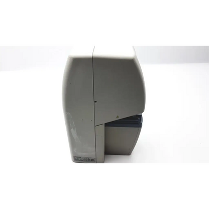Gray zebra label printer with sleek compact design and curved top used with topcon ez 200 advance automatic lensmeter