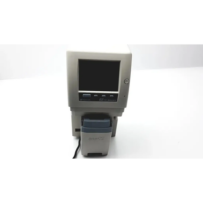 Gray and black Topcon EZ 200 Advance automatic lensmeter with small screen, buttons, and attached printer unit