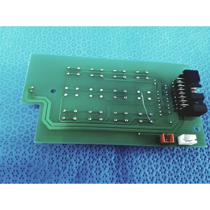 Green rectangular control switch pcb board with silver solder points and black orange white connectors for topcon trc-nw300