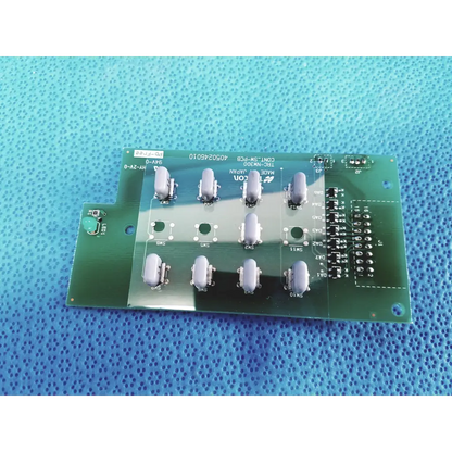 Green printed circuit board with ten gray toggle switches and black connectors for topcon trc-nw300 control switch pcb