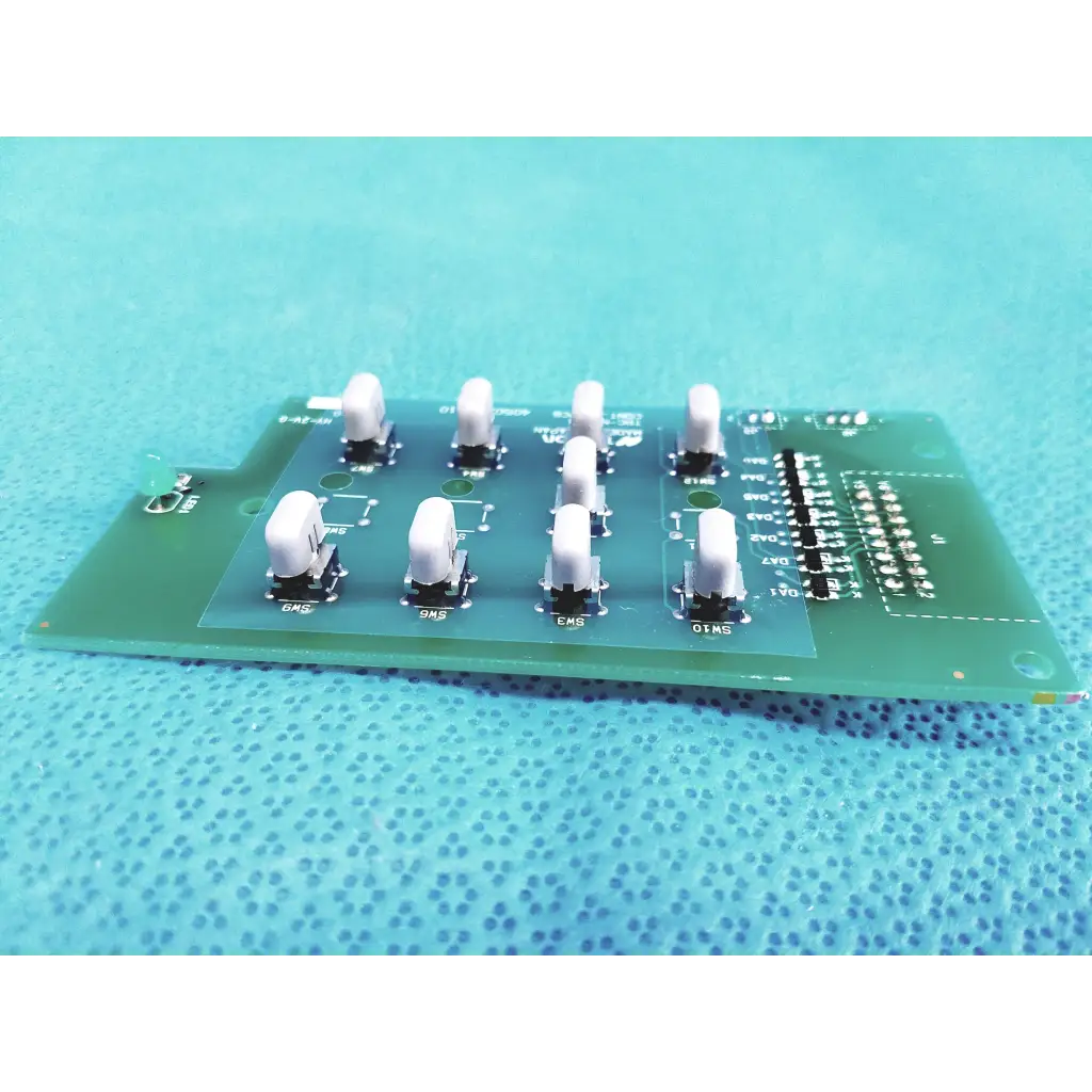 Topcon trc-nw300 green control switch pcb board with white toggle switches and labeled components for precise control