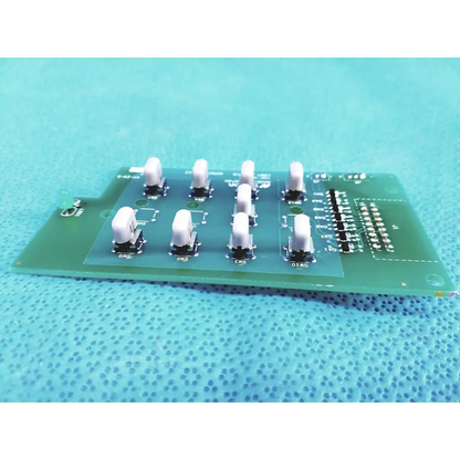 Topcon trc-nw300 green control switch pcb board with white toggle switches and labeled components for precise control