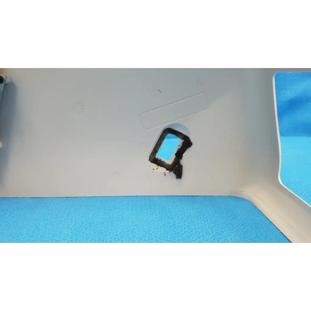 Black-framed rectangular phone screen with blue display in white plastic housing body shroud for trc-nw6s retinal camera