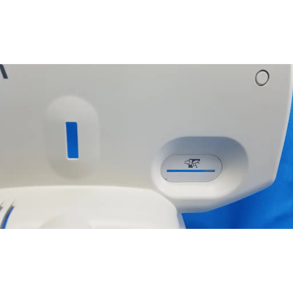 White plastic housing body shroud with blue accents and icon for topcon trc-nw6s retinal camera side cover panel