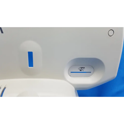 White plastic housing body shroud with blue accents and icon for topcon trc-nw6s retinal camera side cover panel