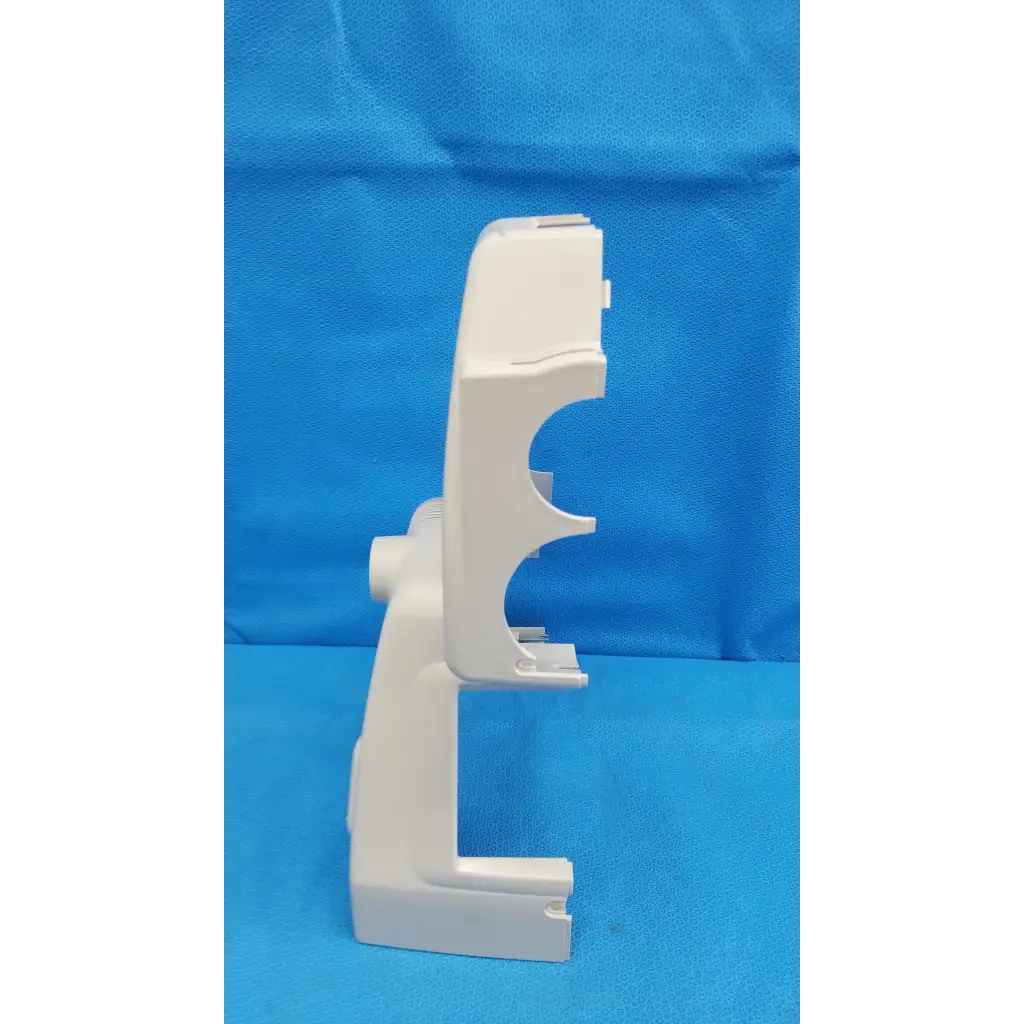 White plastic phone stand with sleek curved cutouts for secure placement as trc-nw6s retinal camera housing body shroud
