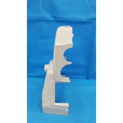 White plastic phone stand with sleek curved cutouts for secure placement as trc-nw6s retinal camera housing body shroud