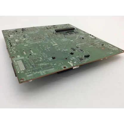 Green rectangular circuit board with electronic components and traces for Toshiba Estudio 2830c main system board with RAM