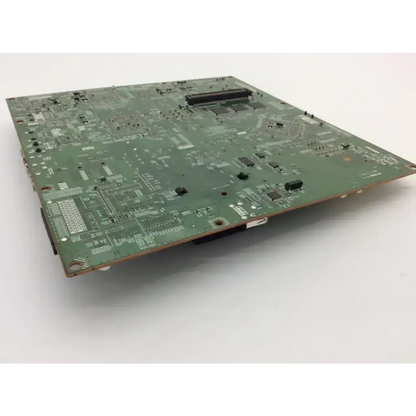 Green rectangular circuit board with electronic components and printed traces for toshiba estudio 2830c main system board