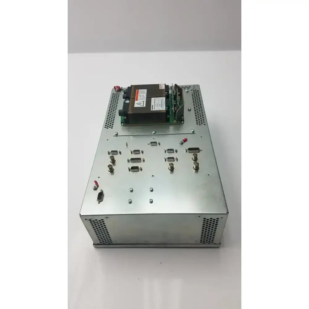 Silver metallic toshiba high voltage power supply vp-33327 with perforated panels and green circuit board on top