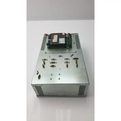 Silver metallic toshiba high voltage power supply vp-33327 with perforated panels and green circuit board on top