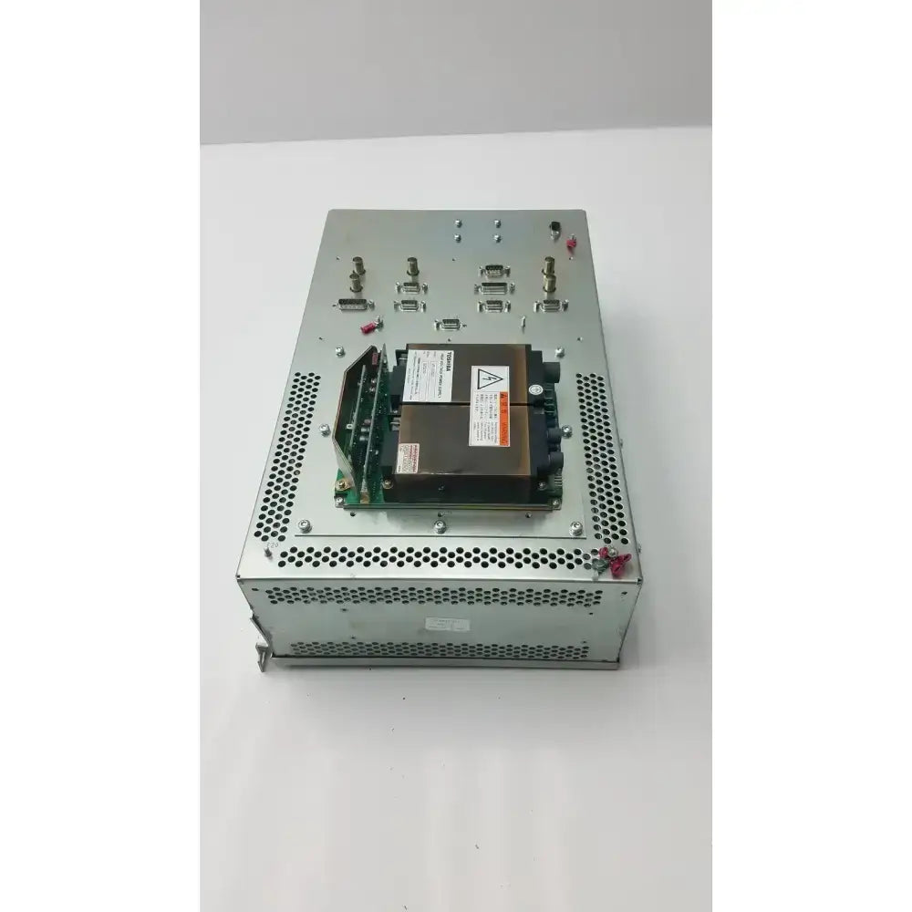 Silver metallic Toshiba high voltage power supply VP-33327 server rack with perforated sides and central circuit board assembly
