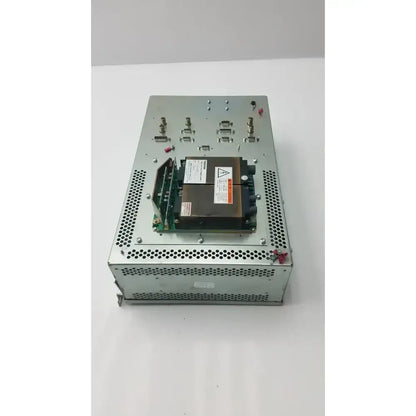 Silver metallic Toshiba high voltage power supply VP-33327 server rack with perforated sides and central circuit board assembly