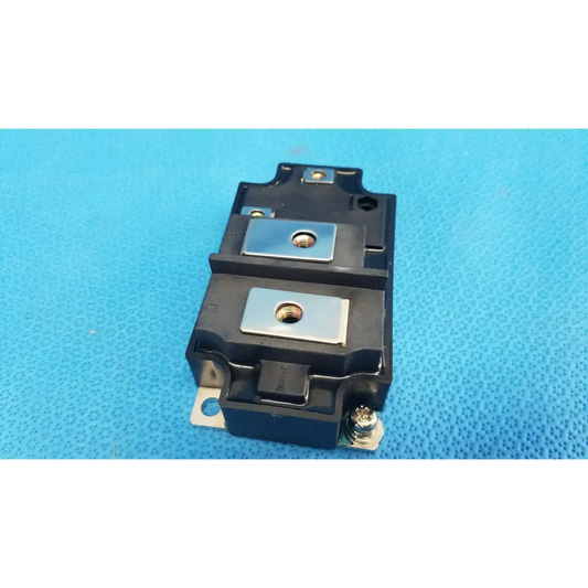 Black plastic mg400j1us51 igbt power module with silver metal plates and threaded holes for retinal camera use