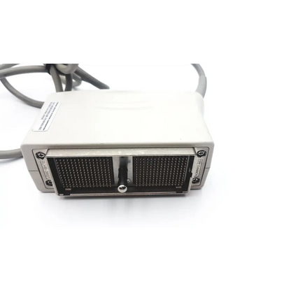 Beige toshiba plt-704at linear array ultrasound transducer showing back with black grid connectors and gray cables