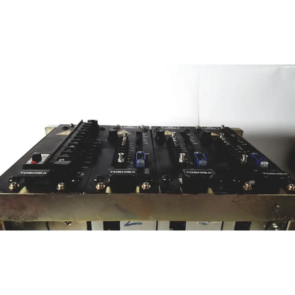 Black toshiba ra power rad92-1008 industrial control panel with knobs switches and blue-lit indicators for power supply