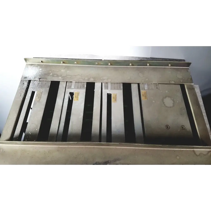 Industrial-grade metal ventilation grille with matte silver finish and vertical slats on toshiba ra power rad92-1008 power supply back side