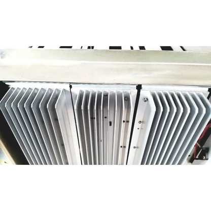Silver-colored aluminum heat sink with parallel fins and mounting screws on toshiba ra power rad92-1008 power supply