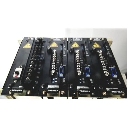 Black Toshiba RA power RAD92-1008 industrial control panels with silver connectors and blue terminal blocks for power supply