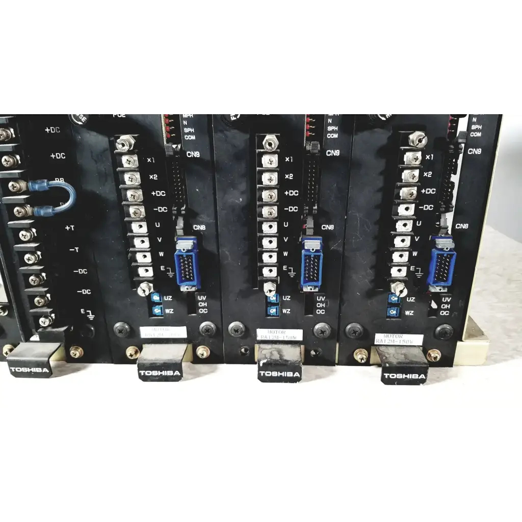 Black toshiba ra power rad92-1008 industrial control modules with blue connectors and silver terminal blocks for power supply