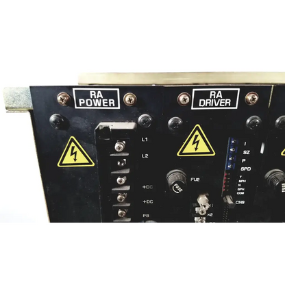 Backside of black toshiba ra power rad92-1008 power supply with labeled sections fuse holder and yellow lightning symbols