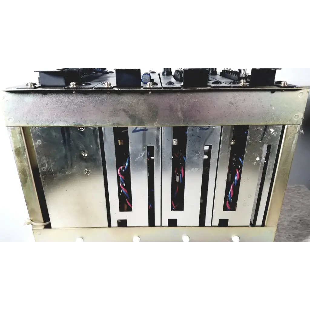 Industrial-grade metal server rack with visible internal wiring and mounting hardware of Toshiba RA Power RAD92-1008 power supply