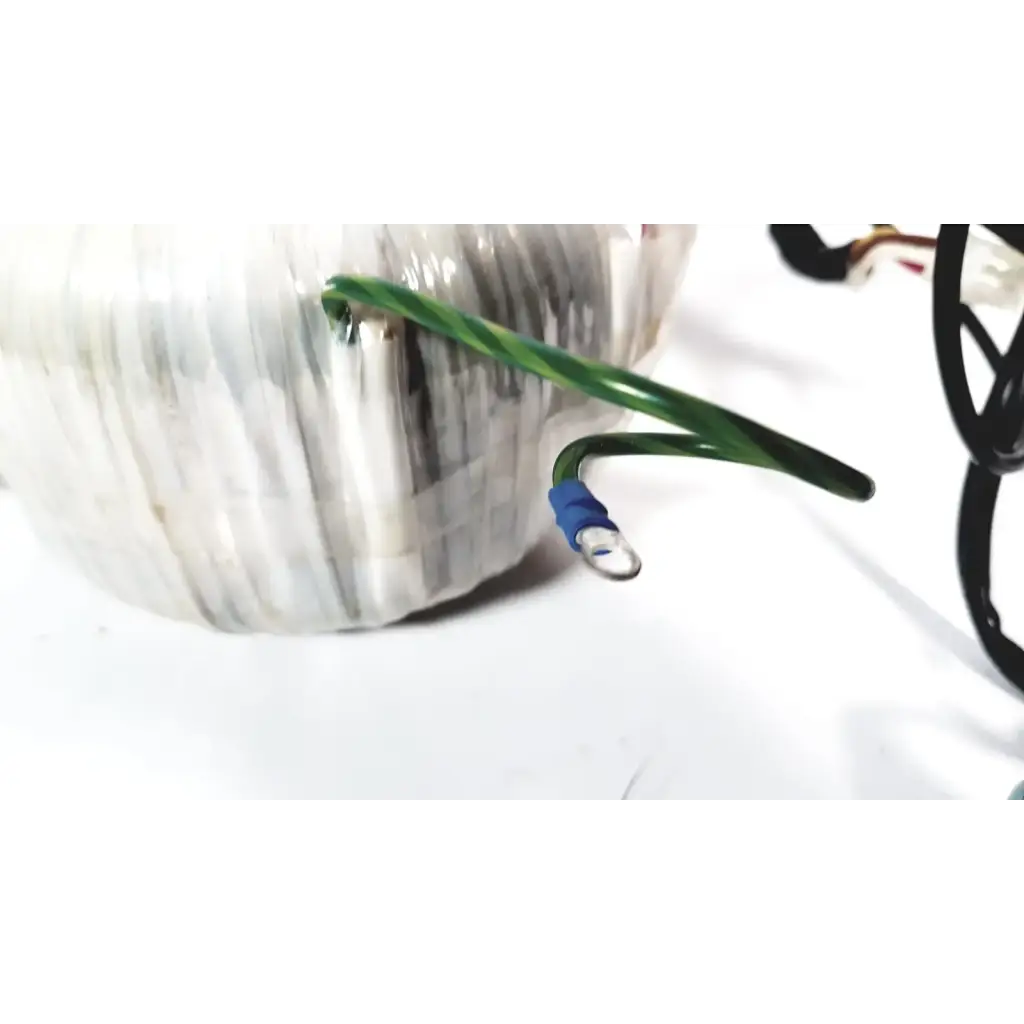 Green insulated wire with blue terminal connector on toshiba transformer bsm31-4471e for xario ultrasound device