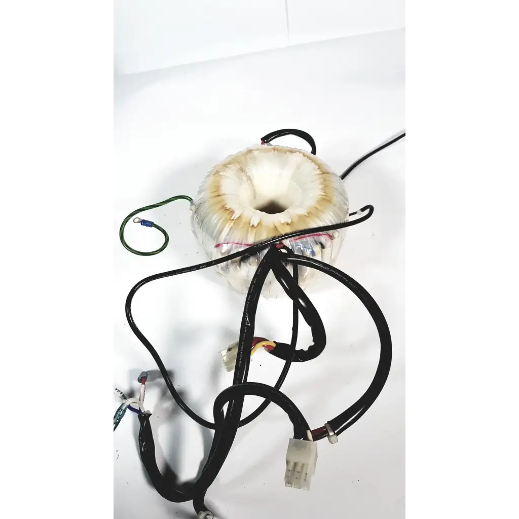 Beige cylindrical toshiba transformer bsm31-4471e with central hole and black wiring for xario ultrasound use