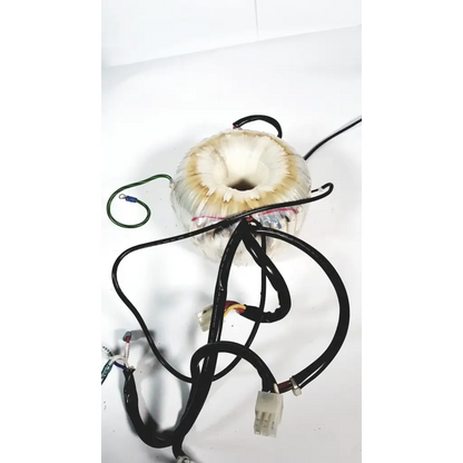 Beige cylindrical toshiba transformer bsm31-4471e with central hole and black wiring for xario ultrasound use