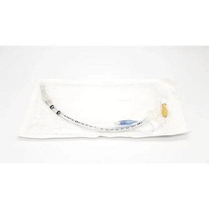 Clear plastic tracheal tube cuffed 6.0 mm with black markings and blue cuff in sterile white packaging