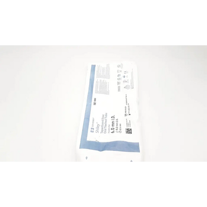 Shiley paperguard evac oral tracheal tube cuffed 6.0 mm in sterile white and blue medical packaging