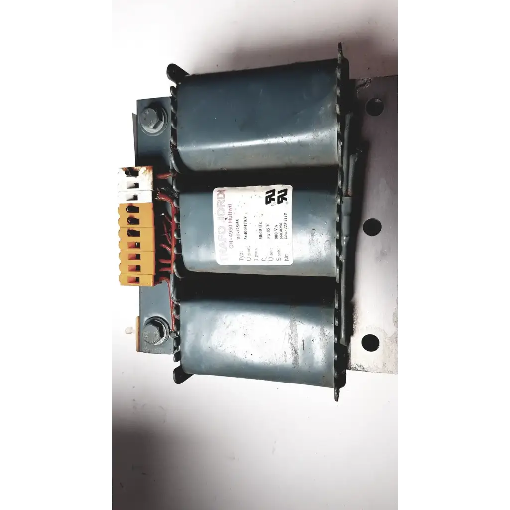 Gray metal trafo jordi ch-4950 huttwil transformer with two cylindrical coils and specification label visible